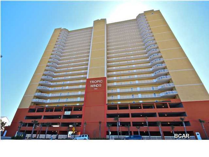 This is a nice WEST corner unit at Tropic Winds on the 18th floor. The unit is a 2 bedroom, 2 bathroom, ~1176 square foot condo with a gulf front master bedroom and a HUGE 10x28 balcony with incredible views. The living area offers an open floorplan with a separate space for dining as well as a breakfast bar. Tropic Winds is a low density development with only 164 units that includes an indoor/outdoor pool (seasonally heated), sauna, fitness center, steam room, community room, gas & charcoal grills, designated pet area for owners, and a large gulf front hot tub. This condo also comes with a dedicated parking space on the 4th floor that is glassed in to protect your vehicle from the elements of the Gulf of Mexico. The condo is priced to sell and worth a look!