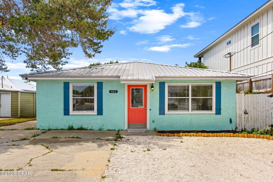 Rare opportunity to own a turnkey short-term rental just a few blocks from the Gulf on the highly desirable west end of Panama City Beach, minutes to the Rosemary Beach entrance to 30A. This 3BR/2BA coastal bungalow has been updated with new LVP flooring, fresh interior paint, expanded driveway for additional guest parking, and a low-maintenance backyard--ideal for maximizing rental performance. Fully fenced yard features a detached storage building with potential to convert into a charming guest suite, bunk room, or flex space (buyer to verify), plus room to add a pool for significant income upside. Projected STR revenue approximately $55K-$70K+ annually. Strong demand for beach properties in this price point--opportunities like this are limited.