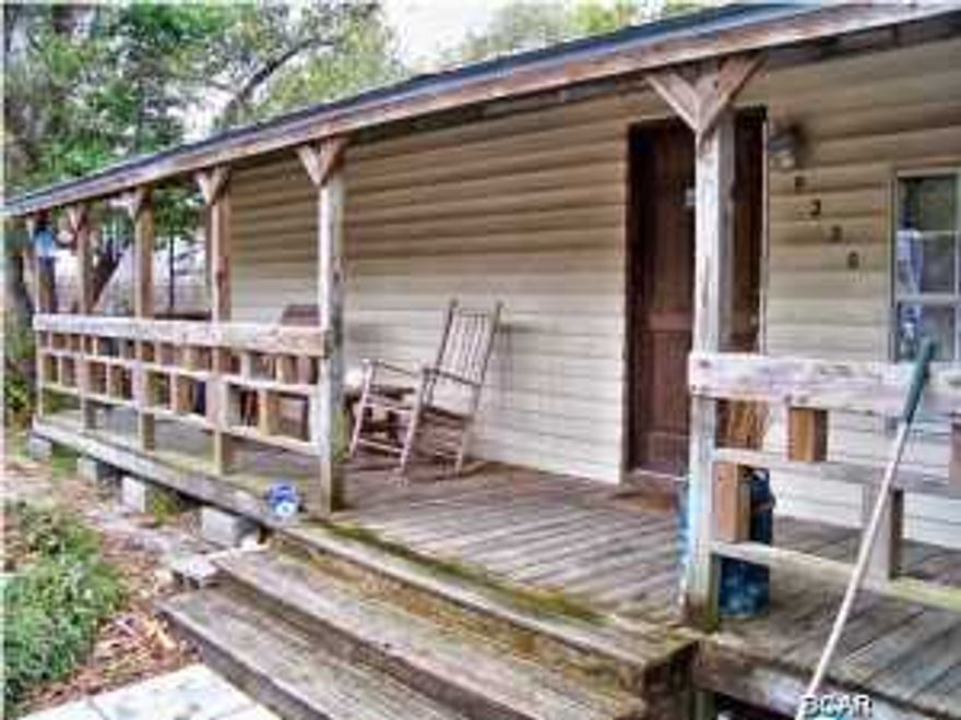 Looking for a beach home or a vacation getaway, and not afraid of a little work? This one is for you. Located in an X flood zone on a 50 x 100 lot and less than two blocks to beautiful St. Joe Beach, this three bedroom, one bath Florida Cottage is a diamond in the rough. Priced to sell and ready for a new owner to make it shine. Walk into a welcoming living room/dining room combo and relax after long days of sun and surf. Prepare your catch of the day in the galley kitchen. Enclosed back porch is perfect to store your beach toys. Conveniently located between all that Mexico Beach and Port St Joe have to offer. All measurements are approximate and should be verified if important.