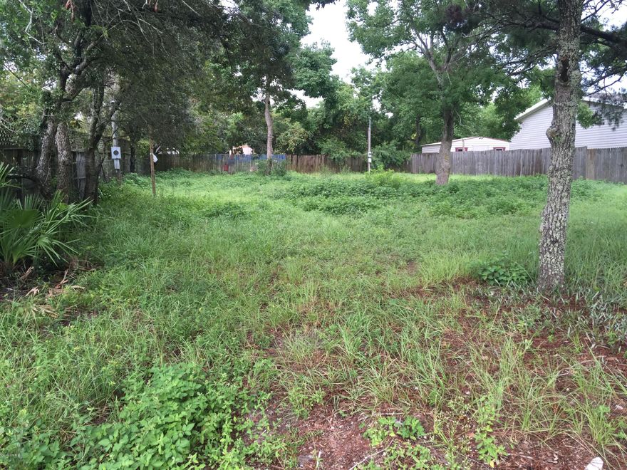 Large cleared loT ready to build on or move your mobile home on. Lot is 70X125. The cheapest lot on the Beaches area. Seller has priced this lot to sell quickly. don't delay if you are looking for a nice lot convenient to everything.Owner Financing:$20k down, 3 year balloon, @10%