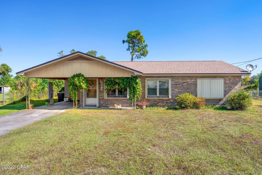 CURRENTLY UNDER CONTRACT, SELLER WILL CONSIDER BACKUP OFFERS. Fantastic Price and Location!!! Charming 3-bedroom 2-bath block home with a nice workshop & situated on a large lot. Big ticket items have been replaced! New roof (on house & workshop), sprinkler system and fence replaced in 2018. Appliances, A/C and Hot Water Heater only 6-7 years old. The home also comes equipped with hurricane shutters. Irrigation is on a private well. Flood zone X, so flood insurance not required. The 576 sq ft workshop has plenty of room for all of your tools and big toys! Property would make a great primary residence or investment property, just needs some tlc to call your own! Short drive to Tyndall, public boat ramp, dining and shopping. Age and sq footage approximate, please verify. Call today!