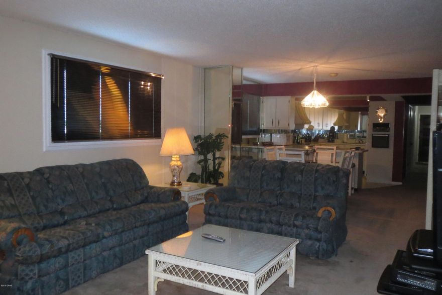 SPACIOUS THREE BEDROOM CONDOMINIUM UNIT WITH VIEWS OF THE GULF! This unit has over 1,560 SF of living space that includes a combination living and dining areaR and just steps to the kitchen with loads of cabinets You will appreciate the large Master bedroom with an an attached Master bath with a shower/tub combination. The two additional bedrooms could be designed with additional sleeping areas in mind. Regency Towers has so much to offer. In addition to the pool and tennis courts, there is a hot tub, food and drink services at the pool, movie nights and special weekly events like karaoke by the pool and on the lawn. This is the perfect second home for a family or someone seeking a strong rental!