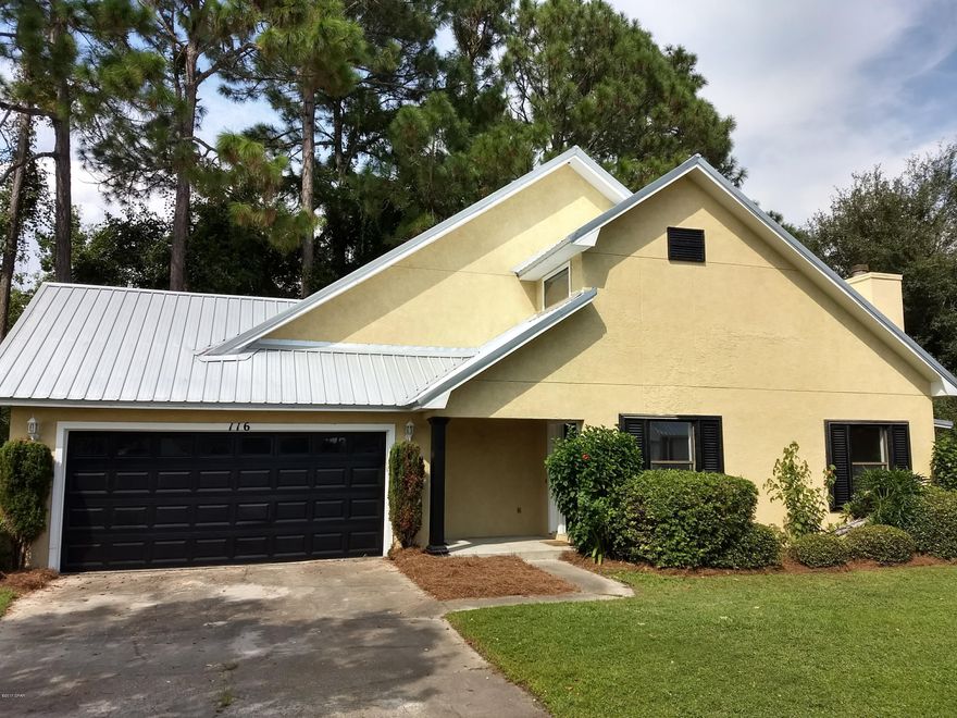 Super home, super location.  Ideal for Navy Base, close access to the Bay, in Breakfast Point school zone.  This 2 story offers lots of family space, sunroom and huge, fenced back yard with deck/patio.  Fresh interior and exterior paint, new carpet, and new metal roof!