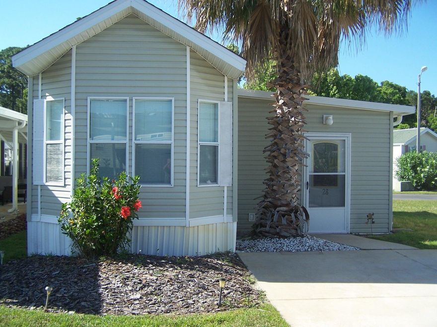 THIS UNIT IS IN TOP NOTCH CONDITION. DINNING AND BEDROOM AREAS HAVE HARD WOOD FLOORS. BEAUTIFUL TILE FLOOR IN LIVING AREA.THIS HOME COMES WITH A WASHER AND DRYER. SOME OF THE AMENITIES ARE GATED SECURITY, CLUBHOUSE, TWO POOLS ONE IS HEATED, WHIRLPOOL. CLOSE TO BEACHES FISHING, SHOPPING AND FINE DINNING.