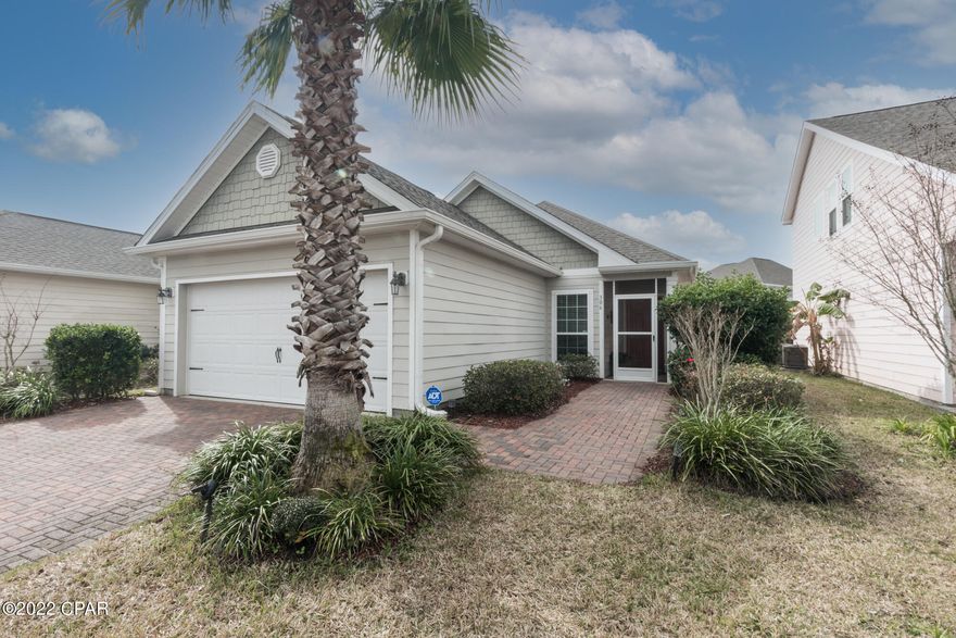 See this coastal craftsman home on the West end of Panama City Beach in the quiet & peaceful Turtle Cove Community that's loaded with amenities!

This home shows like new! Elegant 20'' tile flooring throughout the main living areas, split bedroom design, and open living concept.  You'll love this kitchen with granite counters, backsplash, breakfast bar, and pantry.

Master suite has tray ceilings, large walk-in closet, spacious bathroom with soaker tub, walk-in shower, and dual vanity. 

Guest bedrooms feature beautiful flooring and share a nicely appointed guest bath. 

Enjoy the peace and quiet on your large rear paver patio with landscaping and your own putting green!

Other updates include gutter system, hurricane window shutters, and screened front porch.

Amenities include large pool picnic areas, dog park, clubhouse, rentable banquet room, tennis courts, amphitheater, dog park, fitness room, and fishing dock with access to Lake Powell: the largest coastal dune lake in Florida and North America, covering almost 800 acres! Turtle Cove is close to local amenities such as Pier Park, 30A, Camp St Helen Park, and so much more!
Sizes, dimensions, uses are approximate, buyer to verify.