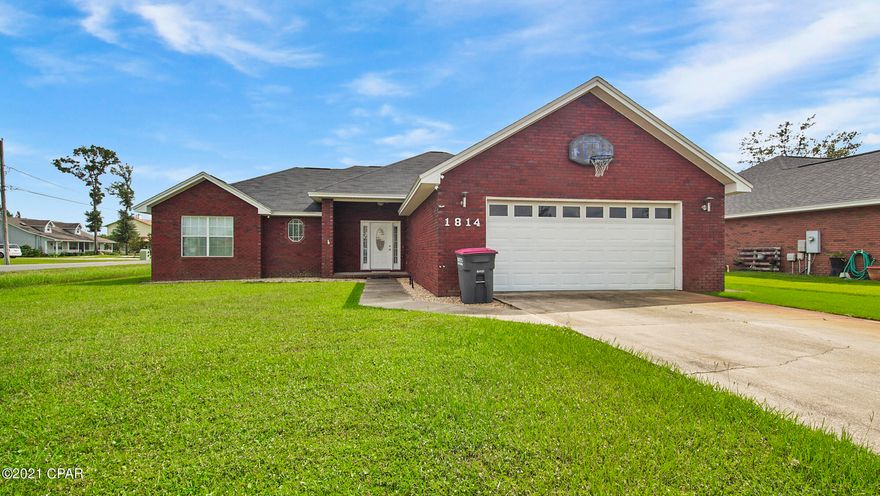 ** CURRENTLY UNDER CONTRACT, SELLER ACCEPTING BACKUP OFFER**This beautiful 3 bedroom 2 bath home is located in the well maintained Britton Woods neighborhood. The brick home has a split floor plan with a large living room and wood burning fireplace. The home offers a 2 year old roof, new paint, irrigation system, and a fully fenced in large yard (with double gate). The irrigation system has its own well. The spacious master has an ensuite with a large walk in closet, double vanity and a separate shower and bathtub. There is a lot of storage space with the 2 car garage. The hot water heater is 2 years old, NEW AC, and all windows and doors come with hurricane fabric shields!! This is in a great location near downtown Lynn Haven, parks, restaurants and shopping!