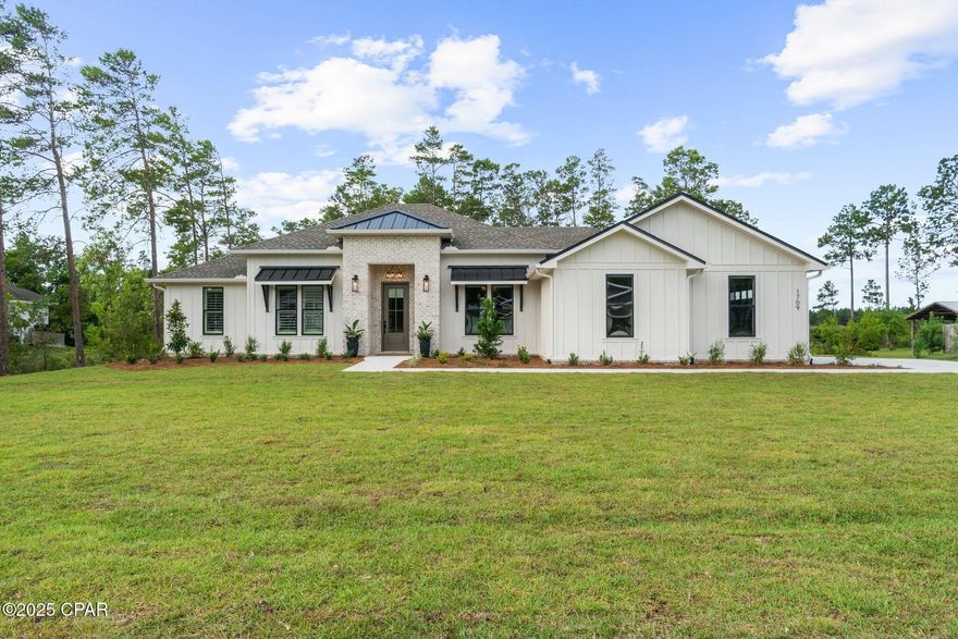 Introducing 1709 White Western Lake Lane, a distinguished new construction residence estimated for completion in Summer 2025. Situated on a serene street just north of town, this custom-crafted home is a product of the sought-after collaboration between Coastal Classic Homes and the visionary team at M.Corb Architectural Design — two names synonymous with craftsmanship, integrity, and refined coastal luxury living.

Thoughtfully designed with a 4-bedroom, 2.5-bath split floor plan, this home delivers both form and function across every square foot. Step inside to find spacious interiors, oversized closets, and a chef-inspired kitchen complete with a large island breakfast bar, walk-in pantry, and expansive dining area built for effortless entertaining.

Enjoy the fresh air on a grand covered back porch with plumbing already prepared for an outdoor kitchen, offering the ideal setting for sunset dinners, weekend gatherings, or quiet mornings with coffee in hand.

Every finish, fixture, and architectural line has been curated for timeless appeal and enduring value. With the current pricing, savvy buyers will secure, a rare opportunity in today's market!

Whether you're seeking a primary residence or a future-forward investment, this home raises the bar for new construction in Bay County. Minutes away from recreational hot spots, schools, and proximity to Lynn Haven makes this the perfect location!

Luxury is being built — make it yours. Connect with an agent to make this dream come true!