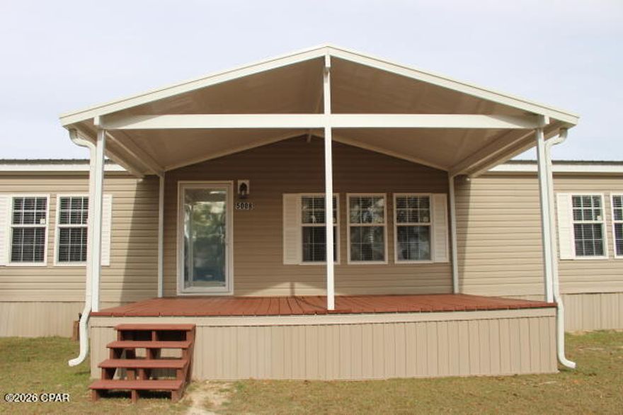 Move-in-ready double-wide mobile home in like-new condition, ready for a new family. This home features a desirable split-bedroom floor plan for added privacy, a gas fireplace ready for propane connection to keep you warm on cold winter nights, and walk-in closets in all bedrooms for ample storage. Enjoy outdoor living on the new covered deck, perfect for relaxing or entertaining. The cleared property offers plenty of space to add a garage, workshop, or even a pool. Conveniently located less than a 30-minute drive to Dothan, Alabama, with a straight shot to Publix on the Dothan Circle, along with numerous shops and restaurants. Marianna is just south, offering Walmart, Lowe's, and additional amenities. Ideal location for those working in corrections and the outdoor enthusiasts, with nearby fishing on the Chattahoochee and Chipola Rivers, swimming at Blue Springs Park at Merritt's Mill Pond, and canoeing at Florida Caverns State Park. Malone offers a great school system and a nearby park for kids to play while you stay active. So much to enjoy, all close by!