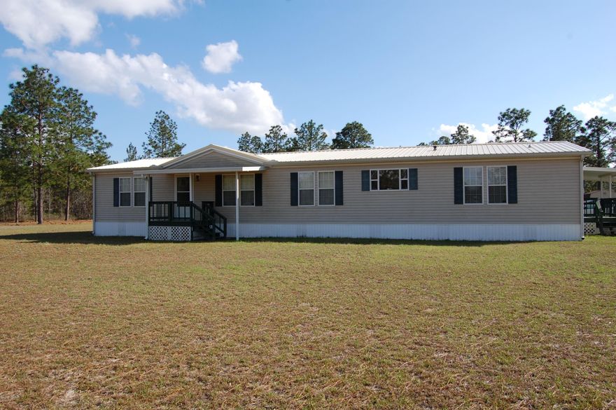 Immaculate 4BR 3BTH home move in ready. Home is very spacious with open floor plan, spacious rooms with nice walk in closets and tons of storage. Home and property are nicely maintained,includes two outside storage buildings and free standing carport. Very small portion of property is wooded. Very convenient to Hwy 231, minutes from Panama City and near airport. Bring the family and move right in! Call for appointment to see!