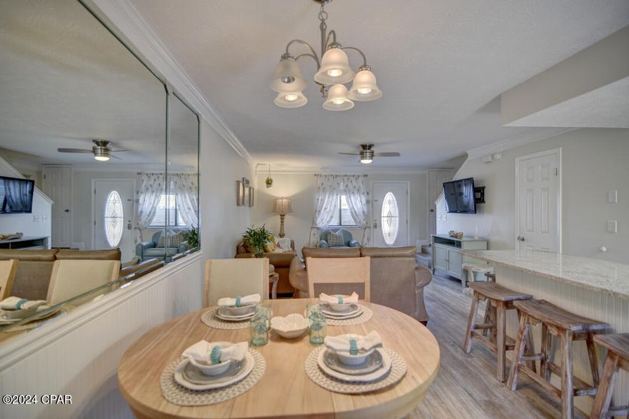 Rare opportunity to own the high end remodeled Townhome in the desired Gulf Highlands Beach Resort. The entire unit has been remodeled with high quality updates. High end wood look tile planks throughout 1st floor and LVP flooring on the second floor, quartzite countertops, solid wood cabinets, vawy subway backsplash, tiled walk-in shower and tub shower , new vanities, fresh paint, lights, shiplap walls in the bath, furniture and accessories etc. Ready to move in renovated, fully furnished unit that  can be  primary residence, 2nd Home or Investment Rental for anyone. You will be amazed by the quality, design and craftsmanship of this Unique Townhome. End unit has cute extended back patio where you can enjoy the evenings and Florida nature while grilling some fresh seafood or steak.