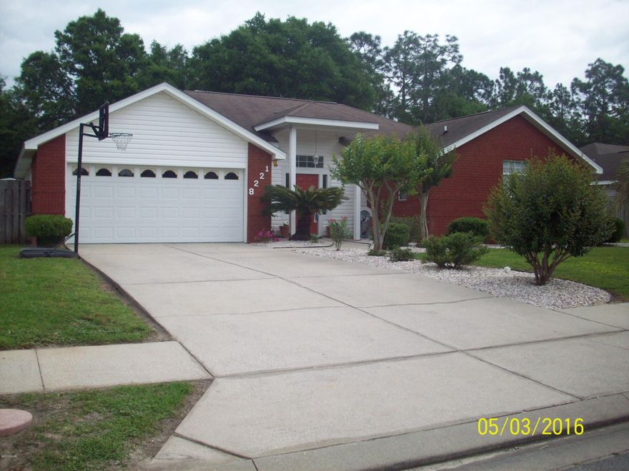 Lovely,  move-in ready home centrally located is only a ten minute drive to Tyndall AFB. If you are looking for a home in excellent condition, spacious rooms with a great floor plan, this is the home for you!  The 16X22 living room has ten ft. ceiling, crown molding, chair rail, dual ceiling fans  and gas fireplace. Preparing meals or just visiting with friends and family in this large kitchen is a joy with  new stainless appliances, plenty of cabinets, plenty of counter space,  breakfast bar, and over-sized pantry.  Separate laundry room is conveniently located next to kitchen. Master bedroom is 14X18 with a large walk-in closet and tray ceiling.  Master bath has another walk-in closet and double sink vanity.  Additional bedrooms are roomy with large closets.  Second bath has double sink vanity.  This home has great storage space with a linen closet and coat closet in front hallway.  Two car garage has pull down stairs to attic allowing for easy access for extra storage area.    Attached screen porch that is accessed through kitchen, living room or master bedroom is an ideal area for curling up with a good book or just relaxing while enjoying the view of a pretty, privacy fenced backyard.  An 8X16 workshop with a attached 16X16 barbeque porch is another special area that is wonderful for entertaining.  The screened- in hot tub which seats 6-8 is such a soothing way of unwinding after a long day!   Sure to be a big hit for all members of family and friends/  All around you is the sight and sounds of nature at it's best.  Sprinkler system is on private well so all outdoor water use cost nothing.   Home is on street tucked away on cul de sac so no through traffic.   Great neighborhood!   Pictures cannot do justice to this property.  It is a must see.  Call and schedule a showing today.  You won't regret it.   Please verify all measurements and  other information deemed important.