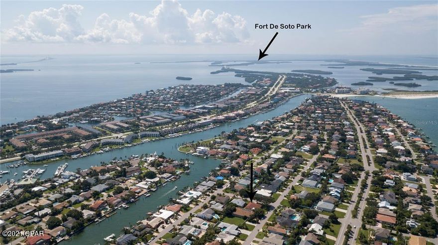 Tierra Verde FL. Island Community

***Seller is in the process of separating the lots, so the lots can be sold separately if buyer prefers. Come live in paradise where others vacation and move into this rare DOUBLE LOT 3 bedroom, 3 bath, 2 car garage pool home on the island of Tierra Verde. The home recently underwent several upgrades totaling over $210,000. The extra full lot can be converted back as a separate lot to build another home on. Or just keep it for all your large toys and extra entertainment space. The major upgrades/updates included a birdcage to enclose the private walled in pool area and outdoor kitchen, the master bathroom, the guest bathroom, and the kitchen upgraded. The homeowner also purchased the empty lot next door and the two lots have been combined which reflects on the tax record. The exterior of the home conveniently has a full RV HOOK UP with a 50 amp outlet, water, and a clean out to empty your RV tanks in. Come in through the grand entrance and the private modern Mediterranean style courtyard with a pool and outdoor kitchen awaits. The area is walled in and bird caged to keep the bugs out. There is a separate private 1 bedroom, 1 bath mother in law/guest house to the right of the front entrance as you come in. The main house is open and inviting and accentuated with an abundant of natural lighting and has tile floors throughout for your peace of mind. The kitchen is well appointed with stainless steel appliances and solid surface counters and solid wood cabinets. The living room, formal dining room and another seating area are open and designed to entertain your family and friends with ease. The second room will include a murphy's bed and connects to the quest bathroom. The master suite is spacious with 2 walk-in closets and a brand new fully renovated master bathroom. You will truly live in paradise in this home. Then you also have award winning beaches such as Fort De Soto and St Pete Beach just minutes away. Other entertainments and restaurants are on Tierra Verde itself and travel on the water and road has been made more convenient with the addition of a brand new taller bridge to eliminate the need of a drawbridge. If you want to enjoy other amenities that Champa Bay has to offer, I275 is minutes away and can take you where you want to go. Schedule your showing today and make this rare 2 lot home yours and live where others vacation! REALTORS, Check out the Realtor Remarks.