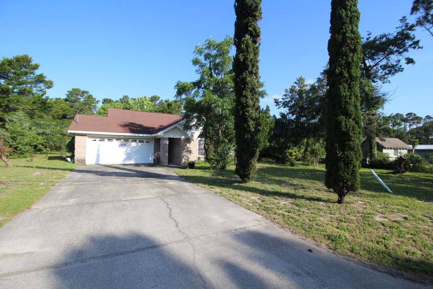 'CURRENTLY UNDER CONTRACT, SELLER ACCEPTING BACKUP OFFERS' Brick home is located on the West End of PCB adjacent to Frank Brown Park. Has an oversized lot and tons of room for your family to grow.  The kitchen, dining and living area are all open to one another.  Nice gas fireplace in the living area and a nice concrete patio.  The master bath shower is handicap accessible and includes his and her closets.

Carpet allowance  of $6000 with acceptable offer.  

**All important info and measurements should be verified before purchase