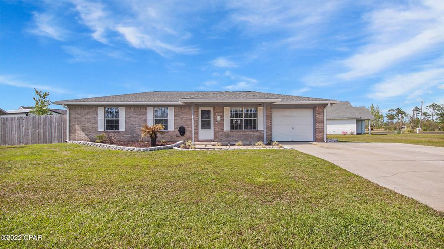 Move in ready brick home situated on a spacious corner lot. Upon entering there is a great room open to the kitchen. Kitchen has granite countertops and stainless steel appliances. Down the hallway are 3 bedrooms. The owners suite has access to the bathroom. All the bedrooms have new vinyl plank. From the kitchen you can get to the laundry area and 1 car garage. The back yard features a covered back porch with decking and a privacy fence.