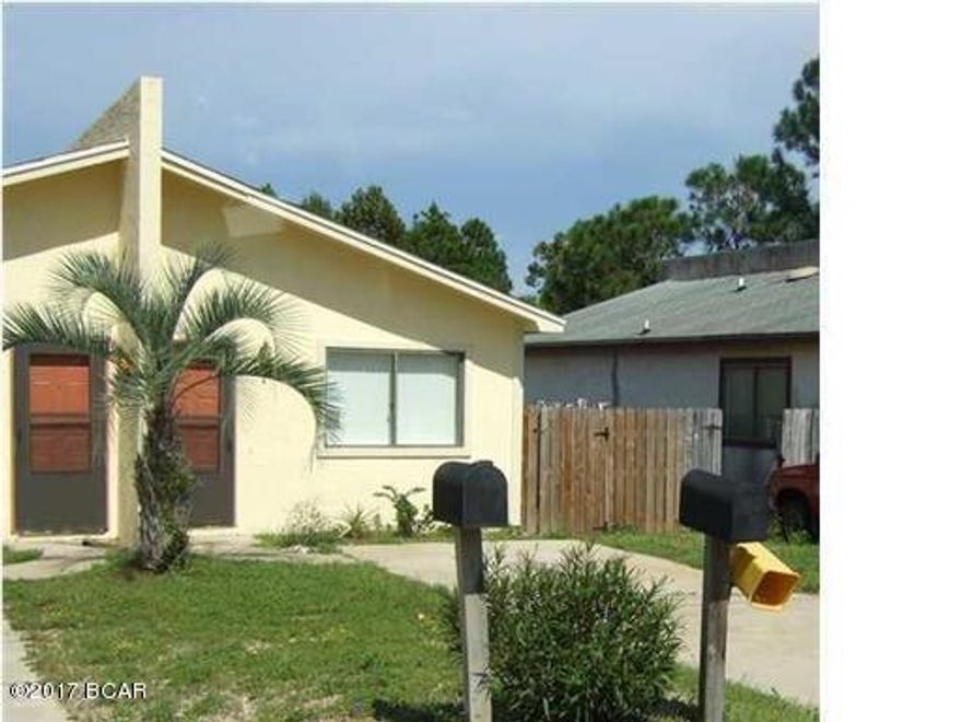 This unit has ceramic tile, new carpet in bedroom.  Fenced backyard. Room sizes are approximate