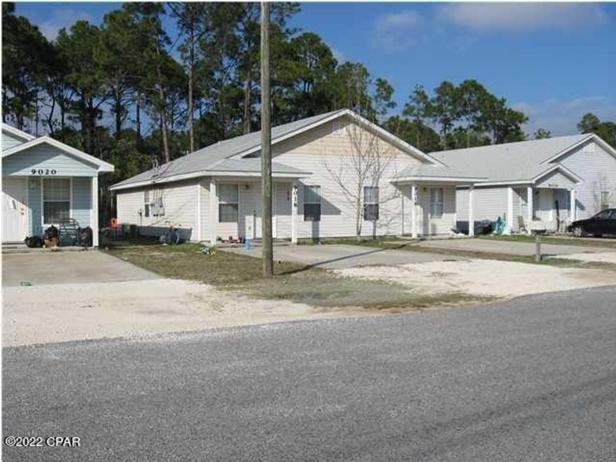 FANTASTIC RENTAL INVESTMENT OPPORTUNITY! This property consists of 4 (four) duplexes or 8 units that are 2 Bedrooms1 Bath per unit.  All four buildings are: 9012/9014 Houston St, 9016/9018 Houston St, 9020/9022 Houston St, and 9024/9026 Houston St. All units are currently on long term leases with varied ending dates. These units are a short distance to the beach, shopping and dining. They have vaulted ceilings, kitchen/dining room combo, breakfast bar, washer and dryer hook ups, and sliding glass doors off of the master with a small patio. Photos on listing are of one unit, and used as an example.  Per Bay County, with regards to short term rentals, are zoned ''not preferred but no prohibited''.  Please call Bay County Planning and Zoning for further information.

Each duplex can be purchased individually.