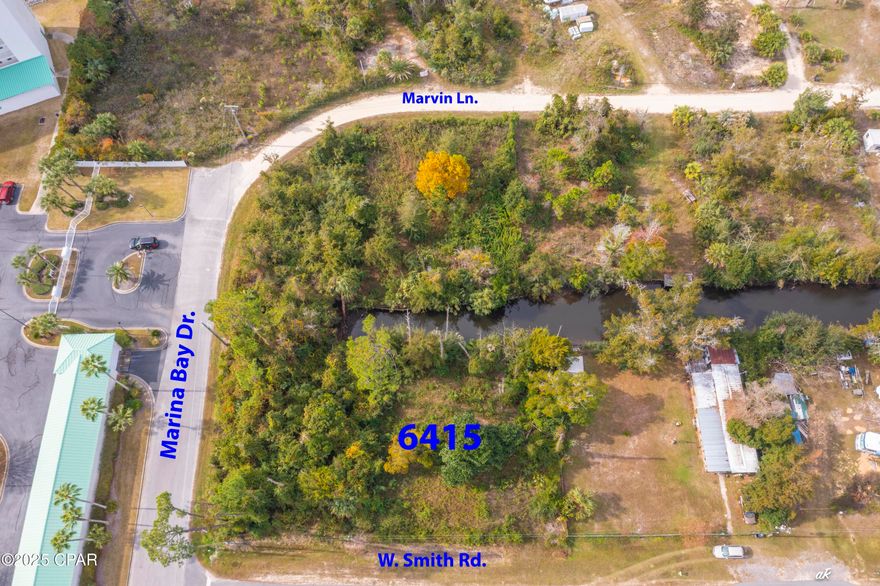 Canal-front property in Southport, located less than three minutes from North Bay. This is an excellent opportunity to build your dream home and enjoy the convenience of having your boat docked directly behind your residence. Don't miss this exceptional lot.