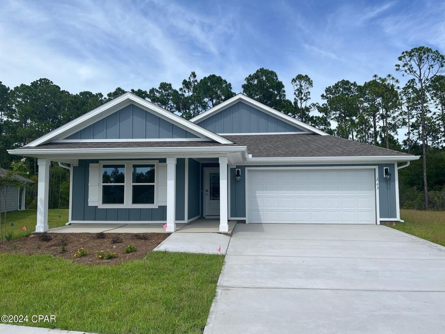 Welcome to 163 Cades Court, a new construction home located in Palmetto Bluff, Port St. Joe, Florida. The Lakeside is a one-story home with a double garage and a large open floor plan. Palmetto Bluff has sidewalks throughout the community, and you will see many beautiful homes. As you walk up to the Lakeside, you will see Hardi Board on all sides as well as gutters, an irrigation system, dimensional shingles with a 30-year warranty, and more. The covered front porch is the perfect size for sitting and enjoying the beautiful sunrises and sunsets of Port St. Joe. As you enter this 5 bedroom, 3 bath home, you will see 2,012 square feet of spacious, comfortable living. Inside you will see 8' ceilings throughout, engineered vinyl plank flooring throughout the home including the bedrooms. Beautiful granite countertops, white cabinetry and a spacious open living room and kitchen make this home perfect for having guests over. The kitchen has a center island that is ideal for serving kids or guests, a nice size pantry and the stainless-steel appliances include smooth top range, microwave, and dishwasher. Located right next to the dining area, this makes serving meals with ease. The primary bedroom has a spacious bathroom and features a double vanity with granite countertops. A walk-in closet with ventilated shelving is also located in the bathroom, giving you more room in the primary bedroom. The guest bathrooms feature a single vanity with granite countertops and a shower and tub combo. Palmetto Bluff is located right behind Port St. Joe Highschool, so it is just on the outskirts of town. As you drive in, you will notice the beautiful floorplans we feature, including the Cali, Lakeside, and Freeport. Palmetto Bluff also has its own Pickleball Court,