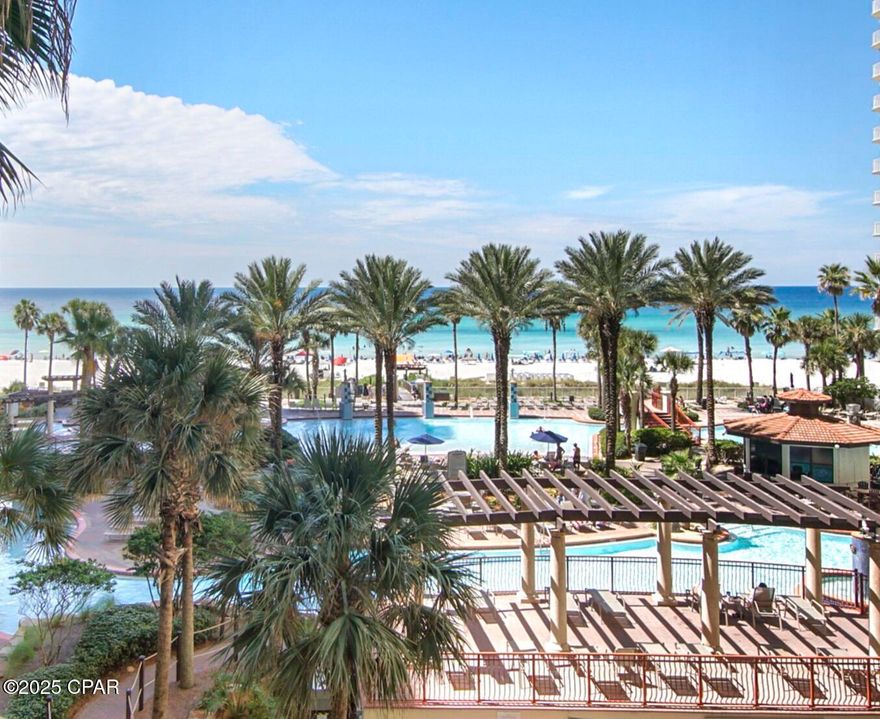 Welcome to The Shores of Panama! - Breathtaking turquoise water views, premium amentities and an unbeatable location!!!

This fully furnished 2 bedroom, 2 bathroom is located on a prime low floor in the highly sought-after Shores of Panama. Freshly painted from ceiling to floor, this condo is move-in/rental ready. Enjoy the lively pool & Tiki bar scene, or kick back on your balcony and take in the perfect people-watching spot from your low-floor view. Either way, you'll feel like you're in the heart of the action without sacrificing comfort or privacy.

The Tuscany-style resort offers 24-hour security and amenities galore — multiple lagoon-style pools, hot tubs, a full fitness center, tiki bars, private beach access and a primo same-floor dedicated parking spot right outside the doors for ultimate covenience!! And when it's time to explore, you're right next door to the world-famous Pineapple Willy's and Parlors Donuts, plus walking distance to mini golf, bowling, arcades, shopping, and so much more!

Whether you're looking for a performing investment or your own piece of paradise, this unit checks every box! Low floor, oceanfront views, premium parking, and location, location, location!