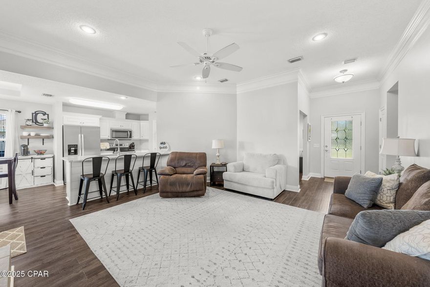 ::CURRENTLY UNDER CONTRACT, SELLER WILL CONSIDER BACKUP OFFERS::
Welcome to this beautifully maintained and thoughtfully updated home, offering both comfort and functionality in every corner. Step inside to find luxury vinyl plank flooring and plush carpet installed in 2018, setting a warm and inviting tone throughout the main living spaces.

The kitchen features stunning granite countertops, stainless steel appliances (2019), and a deep, updated sink (2022), complemented by a modern backsplash and freshly painted cabinetry. A wood-burning fireplace anchors the living area, perfect for cozy nights in.

The guest bedrooms are spacious and inviting, featuring tray ceilings in one guest room and the main suite, while the second guest room boasts beautiful, vaulted ceilings. 

Additional upgrades include:

- New roof (2019)
- Aquasana whole-house water filtration system 
- External AC unit replaced in 2022
- Shiplap accent wall added in both bathrooms 
- Fresh paint and updated trim work throughout the home
- Renovated bathrooms with modern finishes (2022) 

Enjoy the outdoors from the comfort of your screened-in porch, now with brand-new screens. The fully fenced backyard was updated post-Hurricane Michael, the backyard features a children's playset nestled on organic mulch, and a well-fed irrigation system ensures your yard stays green year-round.

This move-in-ready home blends tasteful upgrades with functional features, making it a perfect retreat for families and entertainers alike. Don't miss your chance to own this beautifully cared-for property!