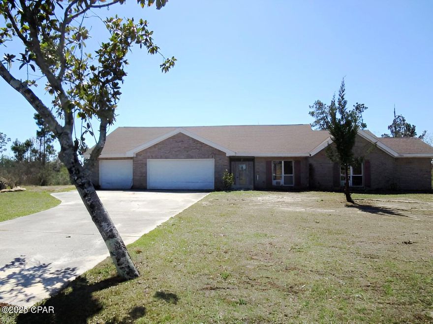 Situated on the Bayou leading to the beautiful coastal waters of East Bay, this waterfront home has so much to offer   Nestled at the end of a cul-de-sac, this all-brick home features a large kitchen and dining area with a bay window that offers loads of light.  There is a spacious living room with french doors to a patio, and additional french doors can be found off the kitchen for a short walk to the water.  The Master bedroom has a walk-in closet with two doors for easy access, and the Master bath has a double vanity, separate shower and a tub.  The two additional bedrooms are a good size with ample closet space.  The roof was replaced in 2018, so this will be one major expense behind you when you start your renovations!  The home does need repairs, but the opportunities to transform this waterfront home are endless!