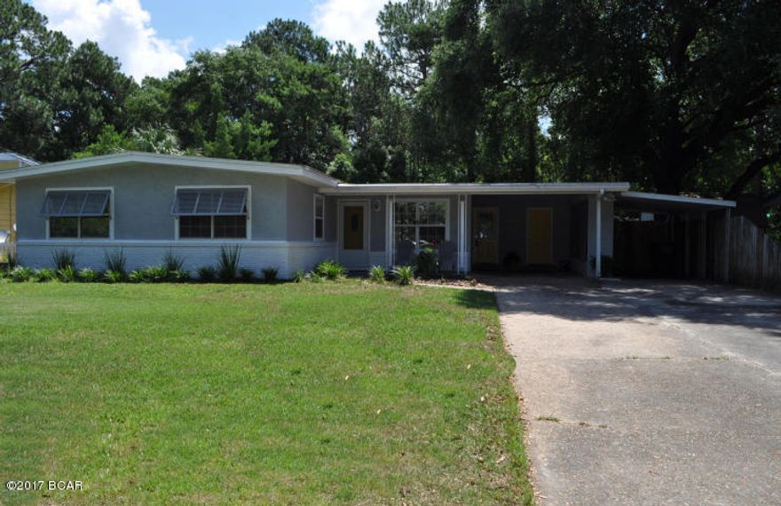 Why shovel snow when you can enjoy the sunshine around your sparkling pool? With 3BR/2BA, approx.1,790 sqft of living space and a fabulous inground pool, this Woodlawn beauty answers the question, “Why move to Florida”? The interior of the home is contemporary yet comfortable with lots of recent upgrades. The kitchen features stainless steel appliances and a custom tiled backsplash, there is a built-in TV nook in the living room, a roomy den that overlooks the pool and patio area, and tons of closet space throughout the home. The backyard is privacy fenced and along with the pool, there is a nice side deck perfect for your own grilling station! The shed is where you can easily store your lawn equipment and in the back of the two vehicle carport is a workshop. The custom fitted guest bath even has a faucet head that lights up when you turn the water on.. shutters were just recently installed too! You're just minutes from the Navy base, schools and shopping, and no flood insurance is required. Woodlawn is a quiet, family-friendly community with a $25 a year voluntary HOA. All info is approx. and must be verified by buyers if important.