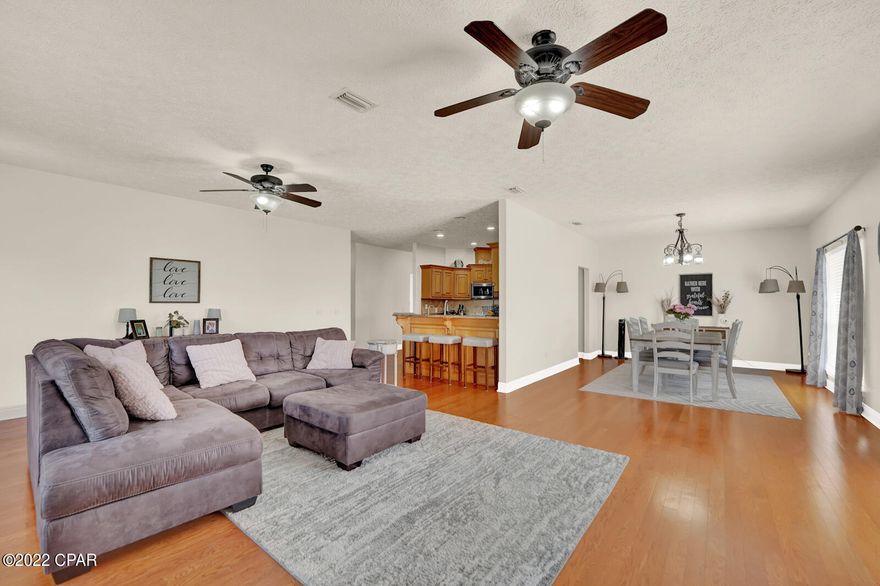 Stunning brick home, amazing location, convenient grocery shopping, on quiet .66 acres?! It's like a DREAM! This home located right by Sweet Bay sits on a gorgeous property with space for all your toys and fishing poles for that pond! This home features an expansive living room, dining room & kitchen! For the owners, they get to enjoy a quiet space along the back of the home with double doors to the screened in porch, walk-in closet (with a second laundry hookup inside), & separate tub & shower. Ask your realtor for the LONG list of all the upgrades including a spot to charge your electric car, firepit, new septic tank, culligan water filtration system, knock-knock oven with air fry capability you can monitor from an app on your phone & an outdoor shower for when you get a pool! Call TODAY