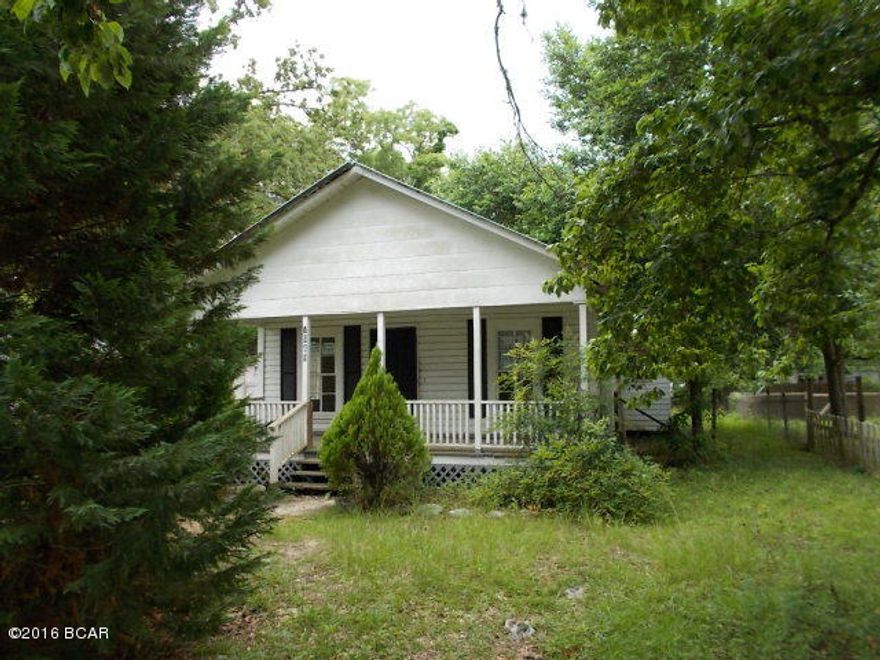 Older home in town, needs work, close to schools and stores.