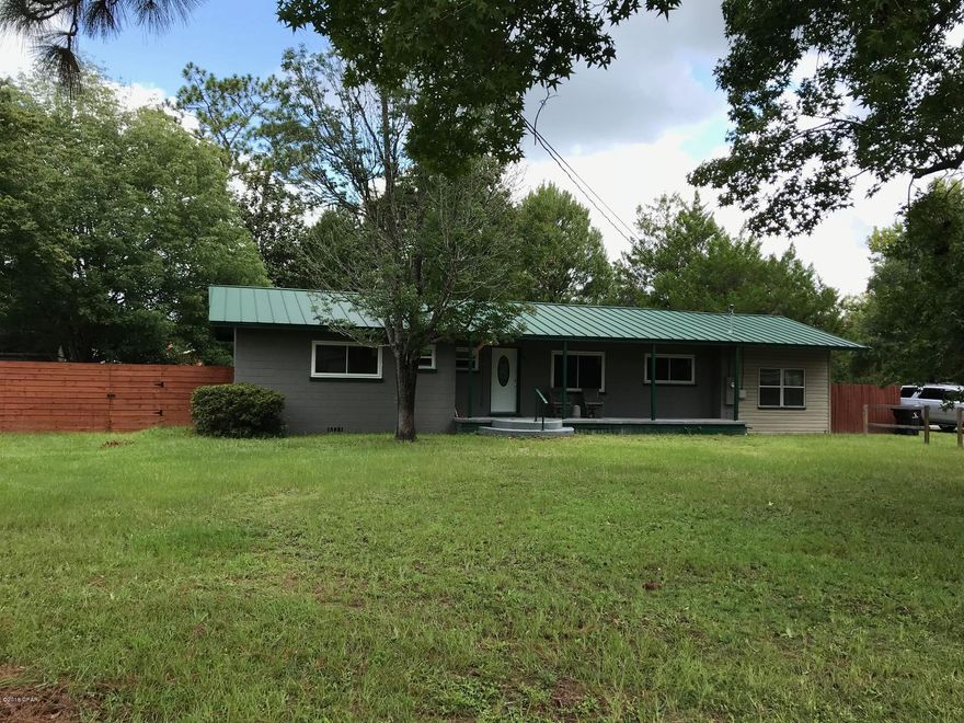 Centrally located to downtown Panama City, 23rd St and Hwy 231 corridors, this home sits on a corner lot with a large fenced in back yard.  Original tongue and groove walls, new windows, and hard wood floors.  Garage has been closed in and could be used as additional office space.