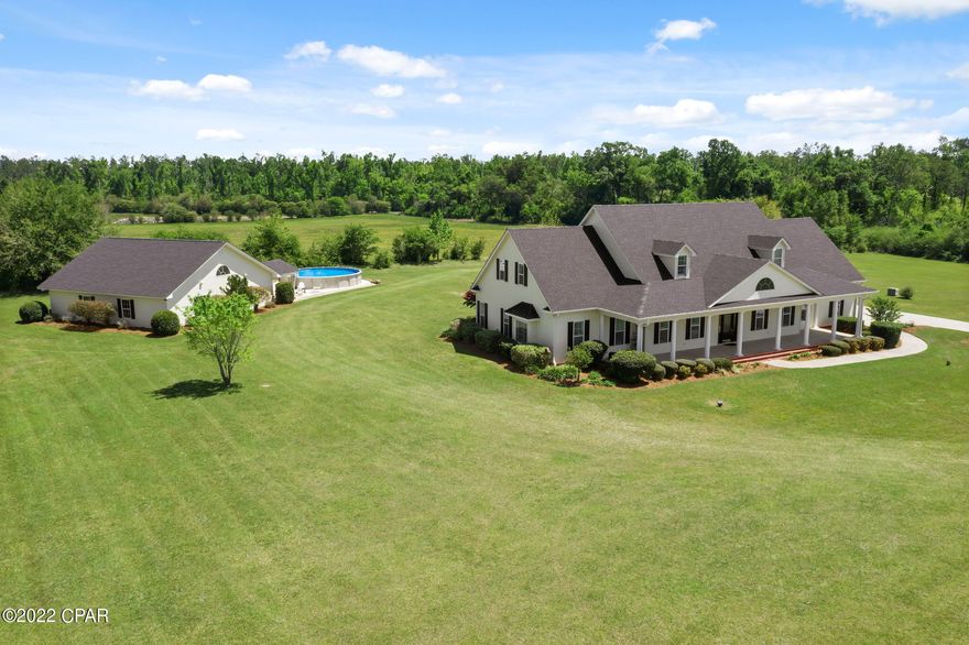 CURRENTLY UNDER CONTRACT, SELLER WILL CONSIDER BACKUP OFFERS.  This immaculate five bedroom home on almost 15 acres is ready for a new family! With over 4500 sq ft of beautifully flowing floor plan, the options to make it your own are endless. As of 2020 the home has been updated with new shingles, siding, shutters, garage doors, windows, gutter system, foam insulation and 2 1/2 ton A/C unit for upstairs.



The inside has new custom window treatments(Shutter style), lighting, paint, laminate flooring, toilets, custom countertops, Kitchen Aid appliances and garbage disposal.  On the first floor you have a garage, master suite with large walk-in closet, office/library, half bath, living room with a fireplace, formal dining room, dining area, and a kitchen with a gorgeous view of the back yard. Upstairs you'll find four more bedrooms and two full baths with laundry chute. Outside is where the entertaining must happen! This home has a one of a kind gathering house with a commercial size kitchen!!! You have to see it to believe it...Just make your appointment to take a look for yourself!