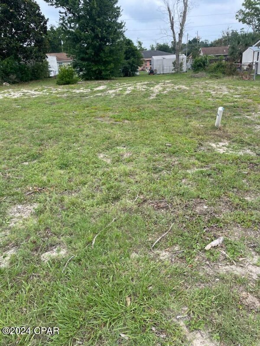 Cleared vacant lot 68 x 110  centrally located near 23rd Street, St. Andrews and five minutes to Panama City Beach..  Convenient to Gulf Coast College, Florida State PC Campus and Carl Gray Park.  

Zoned R-1 with city water and sewer available.
Also this is not in a flood zone per FEMA!
There aren't many lots in this price range nor in this area!