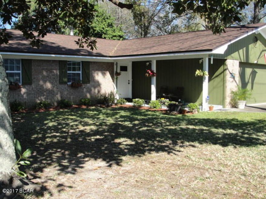 WINNER! Close to the Navy base and the beach!



This beautifully renovated 3 bedroom 2 bathroom 1500 square foot house is an absolute gem! With gorgeous knotty pine ceilings and walls, newly laid laminate wood flooring, open layout and spacious rooms... you will love this house!



Brand new windows throughout the house give it an abundance of light. New doors throughout the house as well as new light fixtures, new paint inside and outside and a new roof.



Spacious living room with a wood burning fireplace. Dining room looks out of the lovely french doors onto the backyard. A well appointed open kitchen has everything you could need including a dishwasher, a large pantry and plenty of cabinet space.



Laundry room just off the kitchen with access to the large 2 car garage.

Master bedroom looks out on the backyard and lets you wake up to the morning light streaming through the many windows. Well appointed master bath has all the space you could need and a newly installed shower.

The second and third bedrooms are perfect for spare bedrooms, children's rooms, or an office, Second bathroom is just off the main hallway. Complete with a shower and bathtub. Lots of closet space in every room.

This house sits on a 1/2 acre carefully landscaped lot. Flowering bushes give the front yard plenty of privacy. The large privacy fenced backyard is adorned with fruit trees. Pick grapefruits, oranges, and limes galore! The back porch was lovingly built around a grapefruit tree. 

Centrally located. Close to grocery stores, shopping, navy base and just a short walk to the beach! Also there's a canoe or kayak launch at end of block with a dock for fishing. Only a 5 minute walk. A 5 minute drive to historic grand lagoon or 10 minute drive to pier park. Public beach access less than a three minute drive with free parking or walk to beach is just about one mile. Property backs to a wooded lot!