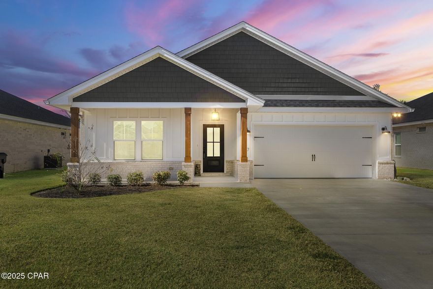 SELLER MOTIVATED with flexible terms available. Conveniently located in central Panama City, this property offers quick access to Tyndall Air Force Base, is just minutes from major shopping and dining along 23rd Street and the Panama City Mall area, close to HCA Florida Gulf Coast Hospital and other medical facilities, and only a short drive to the beaches of Panama City Beach and local coastal attractions.

Outlaw built in 2022, this quality home features custom finishes and thoughtful attention to detail throughout. With 4 bedrooms and 2 full bathrooms, the 4th bedroom includes double doors and can easily be used as a home office.

Enjoy 9' ceilings and an open layout. The kitchen offers custom cabinetry extending to the ceiling, quartz countertops, a large island, luxury tile backsplash, a walk-in pantry, and upgraded stainless steel appliances including a refrigerator. The main living area features crown molding, and the Great Room includes a tray ceiling with additional crown detail.

The main suite includes a double cultured marble vanity, garden tub, separate cultured marble shower with seat, and a spacious walk-in closet. French doors with built-in blinds open to a large covered porch overlooking a landscaped yard with sprinkler system, fruit trees, and a shed.

Additional upgrades include waterproof vinyl plank flooring throughout, LED recessed lighting, upgraded fixtures with ceiling fans, and a garage wired for electric vehicle charging.

Assumable VA Loan available for qualified buyers — an excellent opportunity to take advantage of potential lower rates.