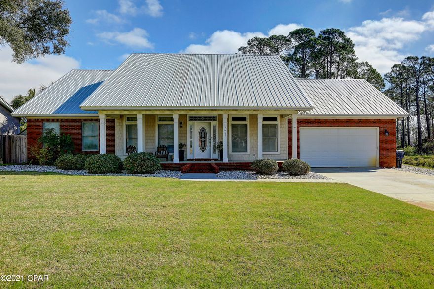 Beautiful home with a pool, outdoor kitchen, tankless water heater and many upgrades. This 3 bedroom 2 bathroom home has a seperate dining room that leads to an open kitchen with upgraded appliances for the chef of the family. The living room has a beautiful stone fireplace with built ins and wood floors. The laundry room is very large and there is a room off laundry room that would make a great home office. The master bedroom is very spacious and master bathroom has large tub, shower and double vanities. The backyard will make you feel like you are on vacation. Screened porch, covered outdoor kitchen, pool, garage for extra car or toys. Don't miss your chance to own this home. It won't last long. Please verify all important information.