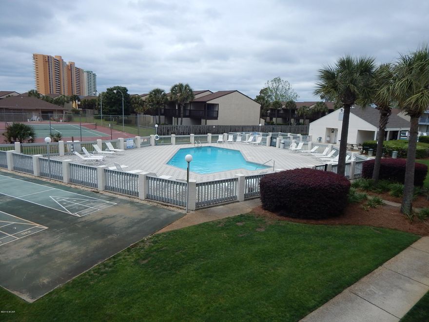 Great Rental or Beach retreat, walking distance to the beach with Access #70 at your doorstep.  Fully furnished unit overlooking the pool and courtyard.  Well maintained as it has never been rented. Ceramic tile throughout with breakfast bar. One of the few units with washer and drier.  Great location near Pier Park and low HOA fees at $266 monthly.