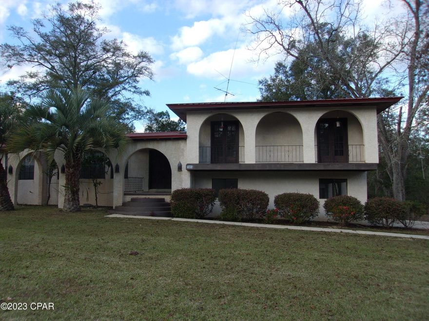 ''Currently under contract Seller will consider back up -offers''.  Nice 3-bedroom 2.5 bath Spanish Style home sitting on almost an acre in small town of Bonifay, Florida. Home has three levels. The main level has a huge living room, dining room, large country kitchen with lots of cabinets and granite countertops, breakfast room, large office/library that could be used as the 4th bedroom half bath and a beautiful marble tile foyer.. The lower level has a large den with a gas log fireplace. The upper level has a large master bedroom with walk in closet and good-sized bathroom with a gorgeous centennial tub, 2 additional bedrooms and a full bathroom.  Lots and lots of storage closets. The screened in porch is off the main level and opens to the 16 ft. X 32 ft. in-ground saltwater swimming pool that has a concrete privacy fence around it. Two car garage with lots of storage space and the laundry area. Beautiful yards with beautiful old oak trees giving it a southern look and nice palm trees giving it that tropical look.  Corner lot in walking distance to shopping and churches. Great home for any family. Great location only 45 miles to Panama City beaches with the worlds most beautiful white sand beaches. The market is hot so don;t wait!! Check it out today!!!