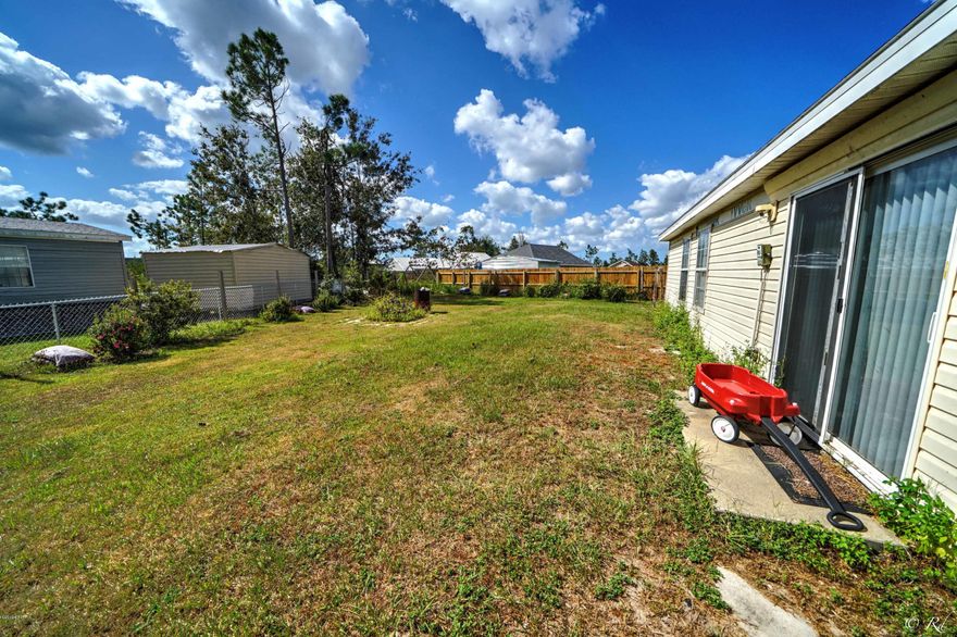 Charming 3 bedroom, 2 bath home located just north of Panama City in Sweetwater 

Village. Just a short distance to schools, shopping and Tyndall Air Force Base. This family home features a spacious eat in kitchen, cozy living area with vaulted ceilings and split floor plan.  The home is located on a cul de sac, has an oversize garage, new roof , brand new A/C unit, new exterior vinyl. The community of Sweetwater is well maintained and offers access to both lakes.