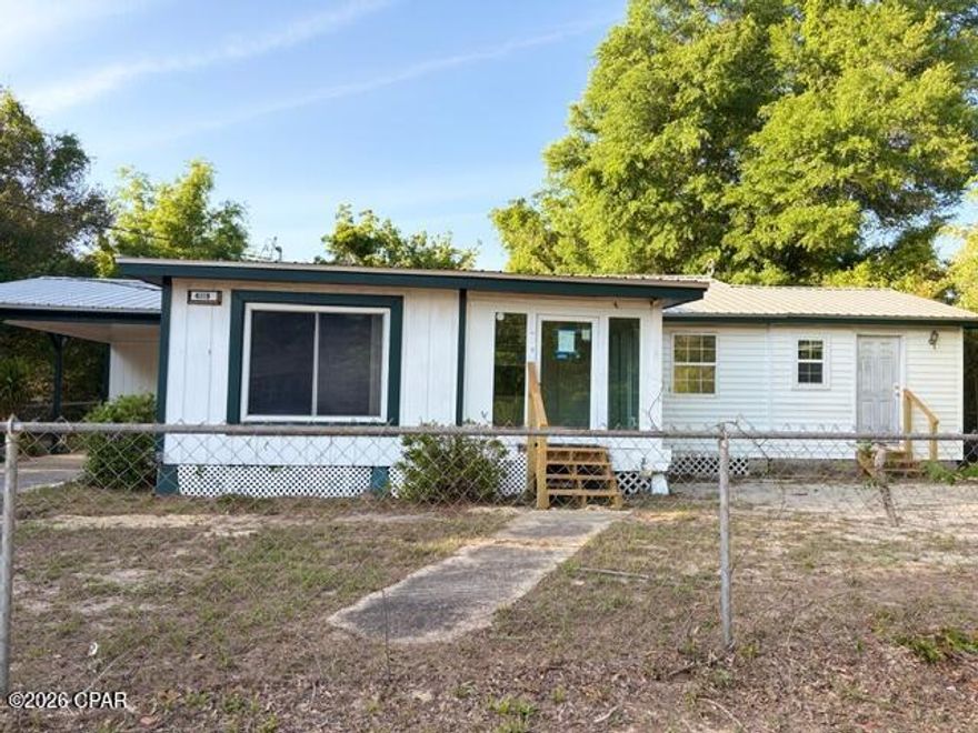 Here's a great opportunity to own your own home, close to great schools, on over 1/3 acre.  This is a 3 bedroom, 2 bath, built in 1956 with new breaker box.  The lot is fenced, front and rear, with a concrete covered patio on the rear of the home and an enclosed front porch on the front of the home, in addition to the heated and cooled square footage.  A carport provides covered parking and there is an unfinished storage room attached.  (Buyer to verify all info, measurements, schools, etc.  All  listing info is approximate.)