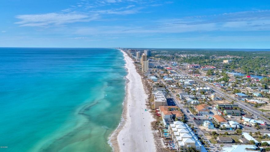 Great Condo with High rentals . Gulf front steps from the sand