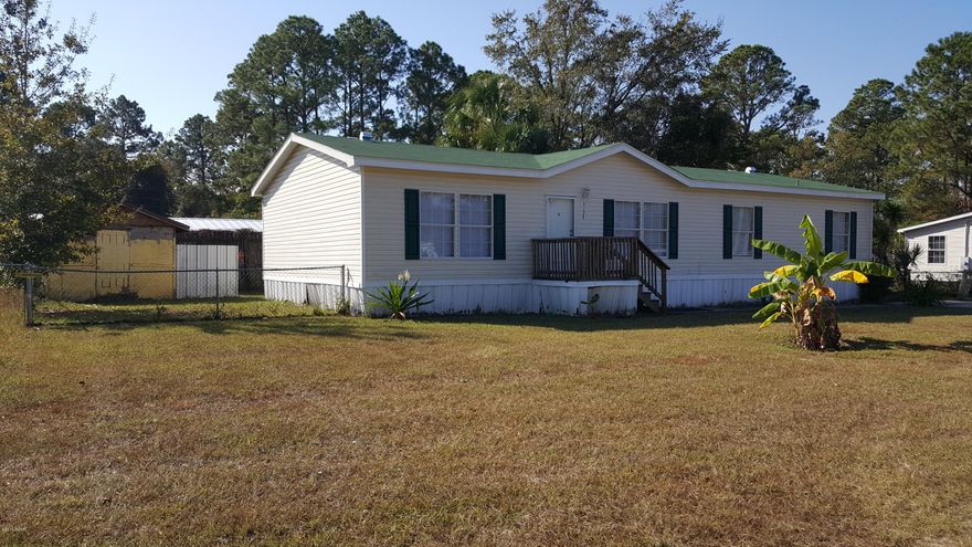 NEW ROOF!! PRICED ADJUSTMENT, SELLER MOTIVATED AND SAYS BRING ALL OFFERS! Great Mobile Home 4 bedrooms, 2 baths, split floor plan!  Perfect for investors and/or the fixer uppers!  Bamboo Hardwood in the living room, the Master bath has a garden tub and separate shower.  Ceiling fans in most rooms and comes with dishwasher, stove and range hood, and some window treatments.  Home is close to shopping, restaurants and Tyndall AFB!  All measurements and information should be verified if important.  Thank you for considering this home.