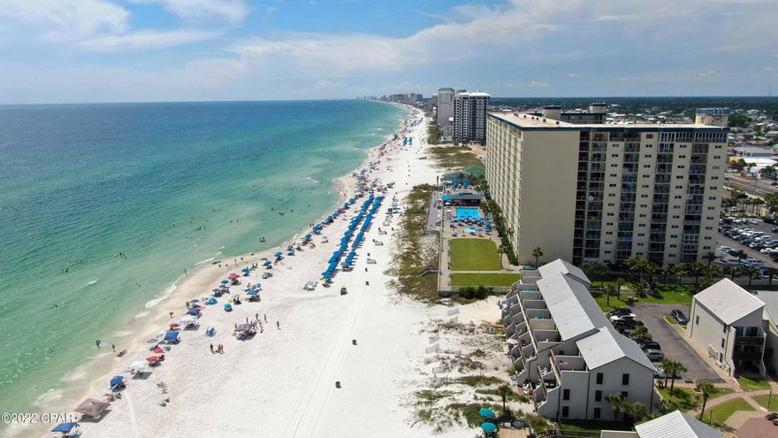 CURRENTLY UNDER CONTRACT, SELLER WILL CONSIDER BACKUP OFFERS Completely renovated from top to bottom condo at the highly desired Largo Mar. Enjoy the Gulf breezes and view from your private main floor balcony!  Located just steps away from the worlds most beautiful beaches! The main level of the unit is located on the second floor of the building and the bedroom with full bathroom is located on the top floor. Private balcony off of the bedroom as well. Balconies, sliders , and windows recently replaced.  Largo Mar offers direct private gated access to the beach. Along with pool, hot tub, outdoor shower, shuffleboard, clubhouse, and more! This property is perfect for any of your needs; primary residence, second home, or short term rental. Buyer to verify all measurements and information