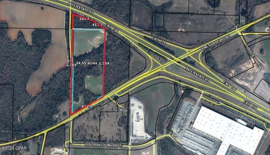 Approximately 34.55 acres of a versatile mix of farmland and woodland, positioned at the corner of Kynesville Highway and New Hope Road. The purchase shall include a portion of the adjoining parcel that touches the south side of interstate 10.  It shall include all lands shown on the main photo outlined in RED.  This diverse parcel offers open fields for agricultural use or future development, complemented by shaded woodlands that provide natural privacy and recreational potential. The property sits with easy access to Interstate 10, enhancing visibility and connectivity for a wide range of uses. With the potential to be rezoned to commercial, it presents a rare opportunity for investors and developers to capitalize on a strategic location near major transport corridors while preserving flexible options for the land's best