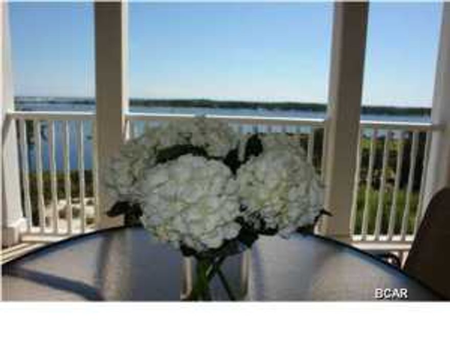 Style and class are what best describes this fully-equipped condo overlooking Grand Lagoon and St Andrews Bay. This picturesque setting comes with views of the Golf Course, St Andrews State Park, Shell Island, and the Pass. The views from this condo are absolutely amazing! Take the elevator down to the 25,000 square foot full-service Serenity Spa and Salon or take a dip in the incredible 10,000 square foot tropical resort pool with private beach area. Located in the peaceful area of Bay Point with only an 8 minute drive to the Strip of Panama City Beach. Bay Point is an upscale gated community with 4 on-site restaurants, 36-holes of championship golf, on-site marina, tennis, and spa. Make an appointment to view this unit today! All info measurements are approximate and must be verified.