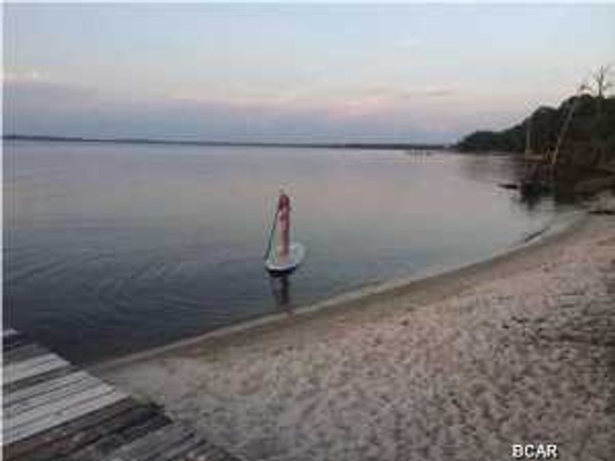 Bay Magnolia is a Nature Lover's paradise with only 44 homesites, underground utilities and Lots of trees to preserve the ''Old Florida'' look and feel. Grayton Beach, Seaside and Watercolor are only about a 5 minute drive to the South to Hwy 30-A. This large lot allows for a main house and a separate carriage house, in the style of design called Florida Cottage style. The Point Washington State Forest is located across E. Pt. Washington and is approximately 20,000 of managed forest. Wildlife is everywhere over here. This private community comes with it's own white sand beach, gazebo and community dock. This property has 193 feet on McQuage Bayou to build your personal dock. Fabulous view's over the bayou and bay. No build out time frame. Water Tap credit is paid.