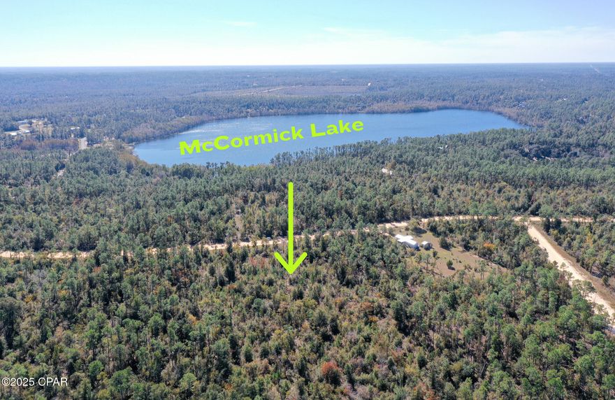 Seize the opportunity to build your dream home or vacation getaway away from the mainstream hustle and bustle, yet close to necessities and access to the World's Most Beautiful Beaches on the Gulf of America! The lush woods, scenic landscapes, and diverse wildlife create a serene environment for those wanting to connect with nature. Equestrian and modular/mobile home friendly as well! Compass Lake in the Hills is a tranquil retreat, offering a relaxing escape from everyday life. Spanning 10,000 acres, this community is centrally located in the rolling hills of Florida's Panhandle, providing convenient access, one hour away from Dothan, AL, but also close to the white sand beaches and emerald waters in Panama City Beach, FL. Immerse yourself in the beauty of two of the most picturesque lakes in the state and feel the gentle embrace of the surrounding forest at every turn. Lot 5 is only 1.8 miles from McCormick Lake and offers several benefits, like a wide span of beach by the lake's clubhouse, a dock, and picnic areas. The amenities of the main campus at Compass Lake, spanning 150 acres, include cabins perched on a scenic bluff with stunning views of the lake and a clubhouse that can be rented for events like parties, weddings, meetings, and more. You can also enjoy boating, fishing, canoeing, and swimming. While lounging by the pool, you'll discover it's just a few steps away from Olle's Restaurant, known for its fantastic German culinary and beer creations. There are MANY MORE amenities.... too many to list! The parcel was cleared for the most part in recent years. Don't miss out on this spacious residential lot that's priced to sell! *HOA membership is optional. GPS COORDINATES: 30°38'40.5'N 85°19'59.7'W
