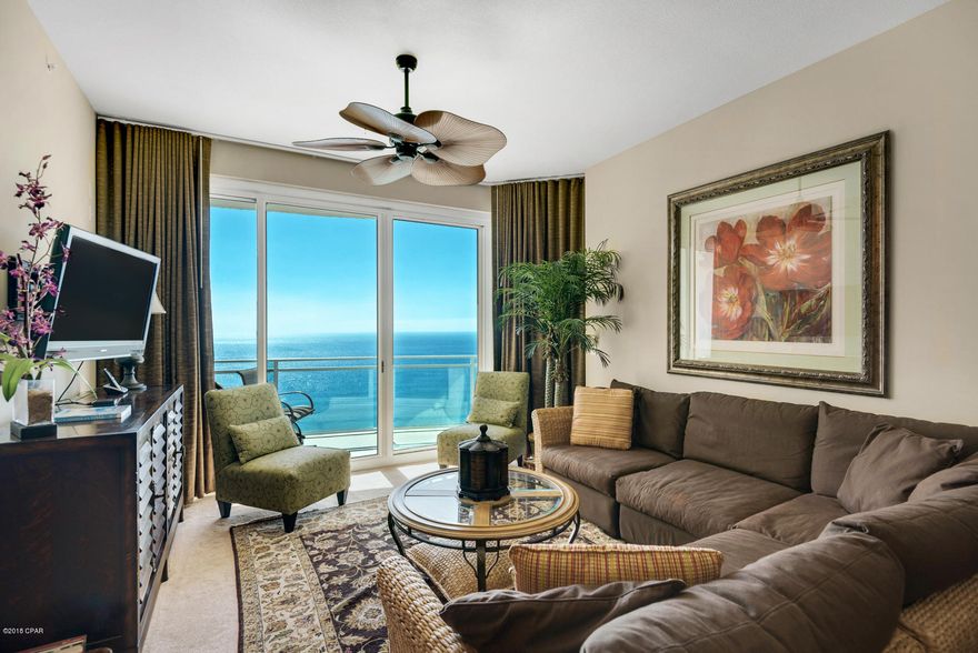 Located on the top floor, penthouse level at Aqua, this beautiful 2BR/2BA+BUNK has been a non-rental and is in excellent condition. Offering gorgeous views NORTH AND SOUTH, you can lounge on the large wrap-around balcony and gaze down the entire coastline to the west, or, look out over the Pier Park corridor and the Bay in the distance. Enjoy 10' ceilings and no loud neighbors above you from this 23rd floor beauty. There aren't too many condos that offer a private balcony AND views all the way down the beach. Instead of rails on the balcony, the penthouse level features panes of glass so your view is unobstructed whether you are sitting or standing. There may not be a better view in Aqua!