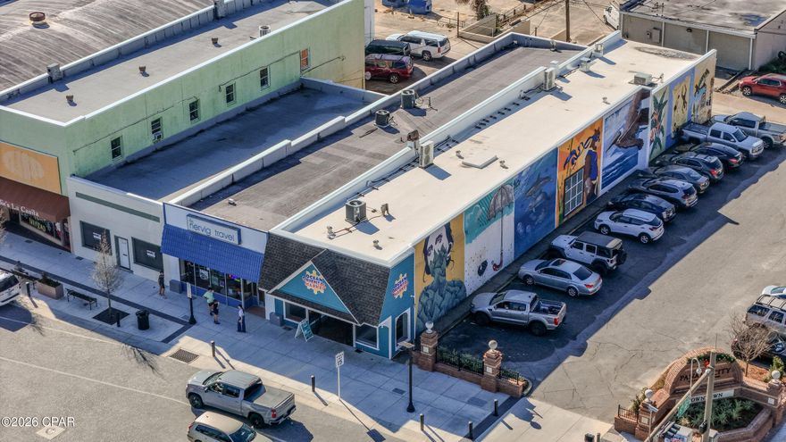 3500 Square feet of retail/restaurant/etc. space on the busy corner of Harrison and 6th Streets right where the bustling downtown starts! It's a beautiful brick building which currently has 8 murals by some of Panama City's best artists. Inside are natural brick walls in the first area as you walk in and painted white in the secondary area. There are two bathrooms, an office space (currently used and set up as a secondary kitchen), full kitchen with commercial vent hood, walk-in cooler and extra storage space with double doors leading to the alley for receiving freight. THIS LISTING IS FOR THE BUILDING ONLY.
 FF&E (Shelving/Coolers/Freezers/Tables & Chairs, etc.) are not part of the transaction but can be purchased as well. Kitchen hood and walk-in freezer are included since they are permanent and go through the ceiling/roof. This is a prime Opportunity Zone property and won't last long!