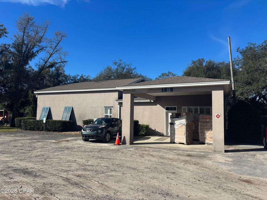 Well appointed office building with ample outdoor space, parking, and a large pole barn. Building features 8 office suites, 3 bathrooms, a kitchen and storage area(s). The fenced in yard totals approximately 2.4 acres making it perfect for a contractor, distributor etc.. Centrally located just off Highway 98 for quick and easy access to much of Bay County.