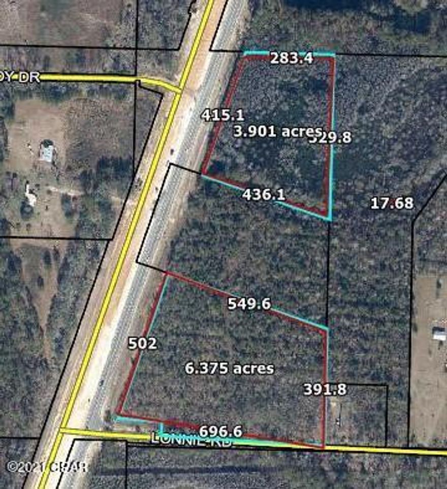 This 10 plus acres on Hwy 77 just minutes south of the town of Chipley.  It is in two pieces.  One piece of just over 6 acres is high ground with approximately 490' on the highway, and 680' on Lonnie Rd.  The second part has some  cypress swamp and includes 417' of frontage on Hwy 77.  It can be a great home location, or it could be used for commercial development.  All of the dimensions are approximations from the property appraiser site, and Buyer should confirm by professional survey if important.