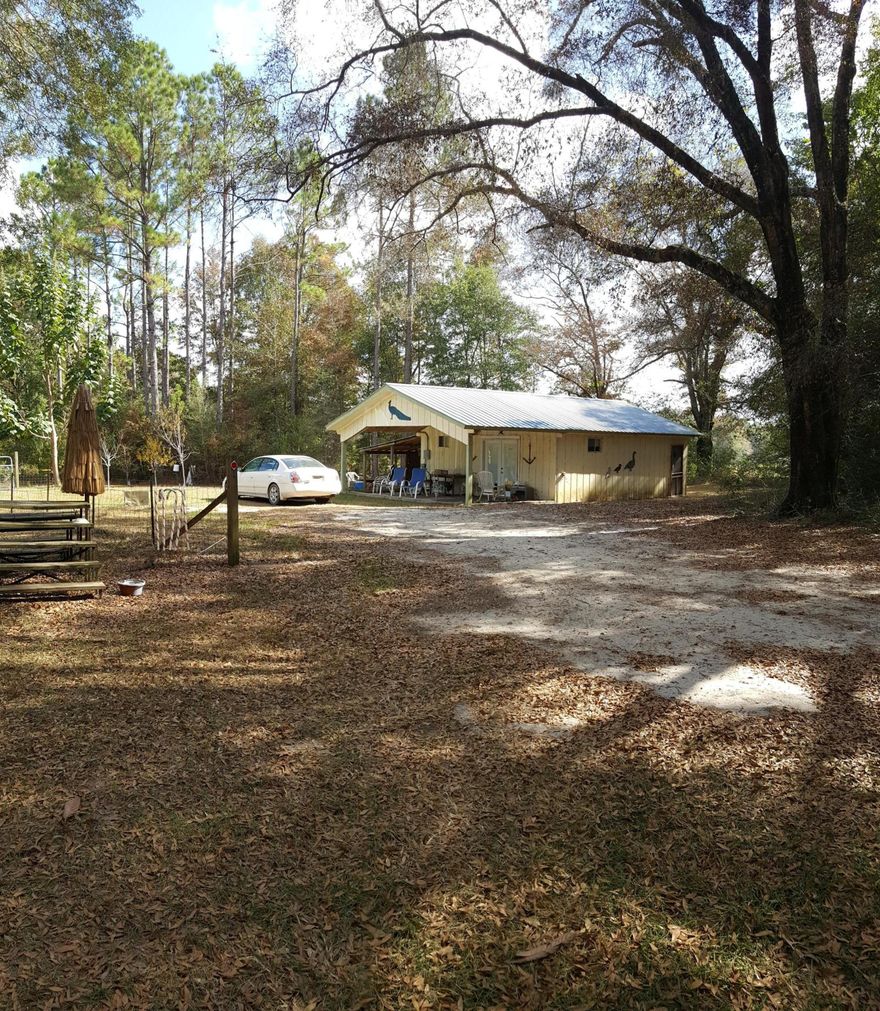 This 3 bedroom 2 bath home is nestled on 3 1/2 acres of beautiful land. There is an additional building that has been converted to a 1 bedroom 1 bathroom cabin, with kitchenette, which would be awesome for guests, rental income or as an extra home for that large family. Will consider owner financing with at least 10K down. *all measurements are estimates and should be verified if important*